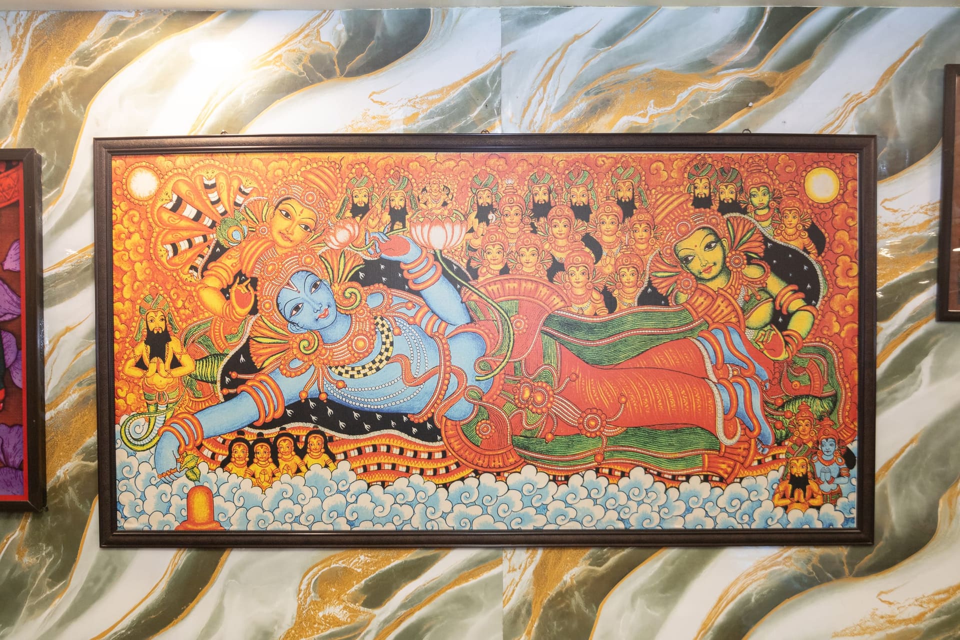 Heritage wall art inside Hotel Ellora Silchar